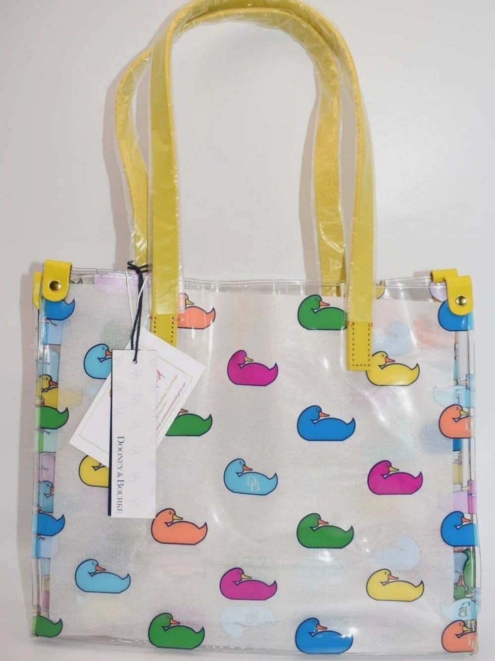 Dooney & Bourke Clear PVC Tote with Colorful Duck Print and Yellow Handles